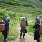 Traditional women in Vietnam. Women are impacted by climate change more than men as greater numbers of women live in poverty and are providers of food and fuel, making them more vulnerable to adverse weather. (Photo: Ives Ives on Unsplash)